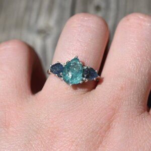 Aquamarine and blue Montana sapphire engagement ring